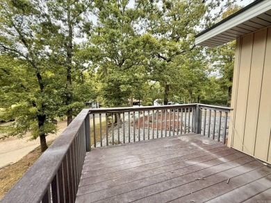 Enclosed glass sunroom offers year-round enjoyment from this on Cortez Golf Course in Arkansas - for sale on GolfHomes.com, golf home, golf lot