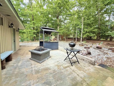 Enclosed glass sunroom offers year-round enjoyment from this on Cortez Golf Course in Arkansas - for sale on GolfHomes.com, golf home, golf lot