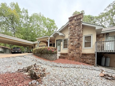 Enclosed glass sunroom offers year-round enjoyment from this on Cortez Golf Course in Arkansas - for sale on GolfHomes.com, golf home, golf lot