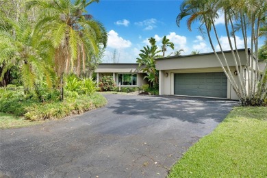 Welcome to this stunning 4 bed, 2.5-bath lakefront home located on Jacaranda Golf Club in Florida - for sale on GolfHomes.com, golf home, golf lot