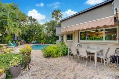 Welcome to this stunning 4 bed, 2.5-bath lakefront home located on Jacaranda Golf Club in Florida - for sale on GolfHomes.com, golf home, golf lot
