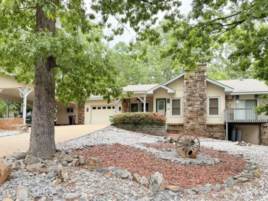 Enclosed glass sunroom offers year-round enjoyment from this on Cortez Golf Course in Arkansas - for sale on GolfHomes.com, golf home, golf lot