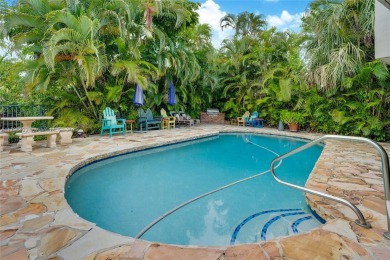 Welcome to this stunning 4 bed, 2.5-bath lakefront home located on Jacaranda Golf Club in Florida - for sale on GolfHomes.com, golf home, golf lot