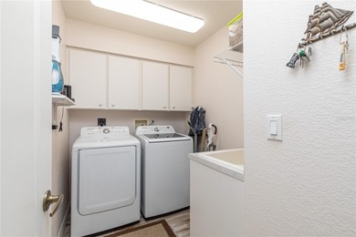 MOVE-IN READY, FURNISHED PGI HOME W/STUNNING GOLF COURSE VIEWS & on Saint Andrews South Golf Club in Florida - for sale on GolfHomes.com, golf home, golf lot