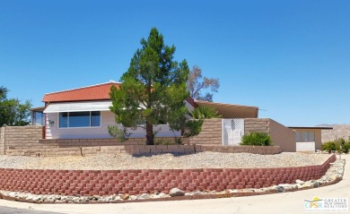 A Shangri-La floating above the rest is awaiting you with this 3 on Desert Crest Country Club in California - for sale on GolfHomes.com, golf home, golf lot