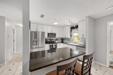 Unique site-built home on hole number 3 of The Orange Blossom on Orange Blossom Hills Golf and Country Club in Florida - for sale on GolfHomes.com, golf home, golf lot