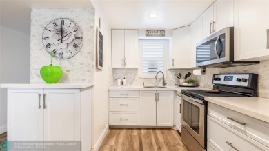 Beautifully remodeled condo with an open spacious layout! Tile on  in Florida - for sale on GolfHomes.com, golf home, golf lot