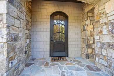 Nestled within the prestigious gated community of Currahee Club on Currahee Golf Club in Georgia - for sale on GolfHomes.com, golf home, golf lot