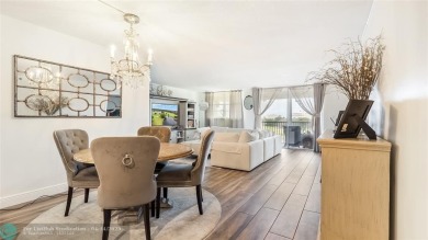 Beautifully remodeled condo with an open spacious layout! Tile on  in Florida - for sale on GolfHomes.com, golf home, golf lot