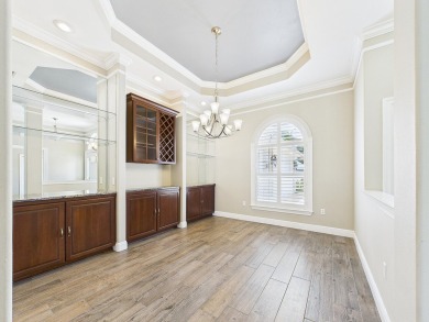 Situated on an oversized lot and a half, this beautifully on Fairway Oaks at Magnolia Golf Course in Florida - for sale on GolfHomes.com, golf home, golf lot