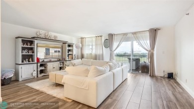Beautifully remodeled condo with an open spacious layout! Tile on  in Florida - for sale on GolfHomes.com, golf home, golf lot