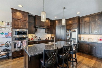Welcome to this spacious and meticulously maintained 5-bedroom on Golf Club of Creekmoor in Missouri - for sale on GolfHomes.com, golf home, golf lot