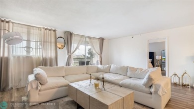 Beautifully remodeled condo with an open spacious layout! Tile on  in Florida - for sale on GolfHomes.com, golf home, golf lot