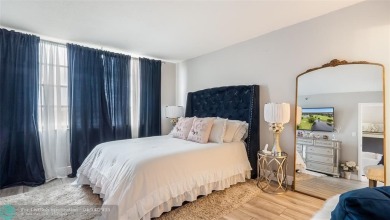 Beautifully remodeled condo with an open spacious layout! Tile on  in Florida - for sale on GolfHomes.com, golf home, golf lot
