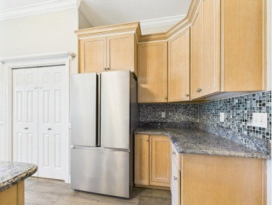 Situated on an oversized lot and a half, this beautifully on Fairway Oaks at Magnolia Golf Course in Florida - for sale on GolfHomes.com, golf home, golf lot