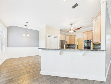 Situated on an oversized lot and a half, this beautifully on Fairway Oaks at Magnolia Golf Course in Florida - for sale on GolfHomes.com, golf home, golf lot