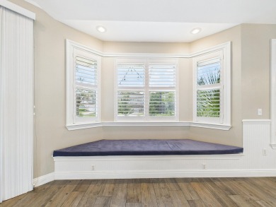 Situated on an oversized lot and a half, this beautifully on Fairway Oaks at Magnolia Golf Course in Florida - for sale on GolfHomes.com, golf home, golf lot