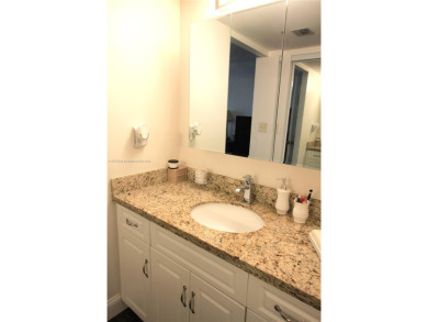 Stunning 2-bedroom corner unit condo with breathtaking golf and on Pembroke Lakes Golf Club in Florida - for sale on GolfHomes.com, golf home, golf lot