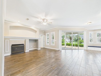 Situated on an oversized lot and a half, this beautifully on Fairway Oaks at Magnolia Golf Course in Florida - for sale on GolfHomes.com, golf home, golf lot