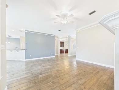 Situated on an oversized lot and a half, this beautifully on Fairway Oaks at Magnolia Golf Course in Florida - for sale on GolfHomes.com, golf home, golf lot