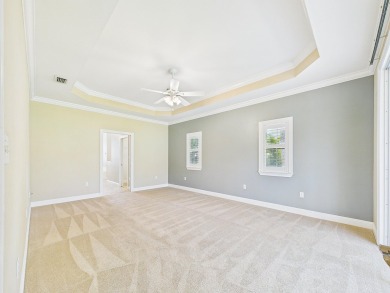 Situated on an oversized lot and a half, this beautifully on Fairway Oaks at Magnolia Golf Course in Florida - for sale on GolfHomes.com, golf home, golf lot