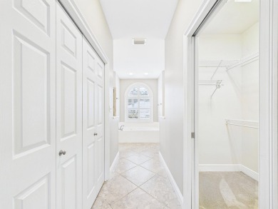 Situated on an oversized lot and a half, this beautifully on Fairway Oaks at Magnolia Golf Course in Florida - for sale on GolfHomes.com, golf home, golf lot