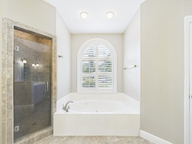 Situated on an oversized lot and a half, this beautifully on Fairway Oaks at Magnolia Golf Course in Florida - for sale on GolfHomes.com, golf home, golf lot