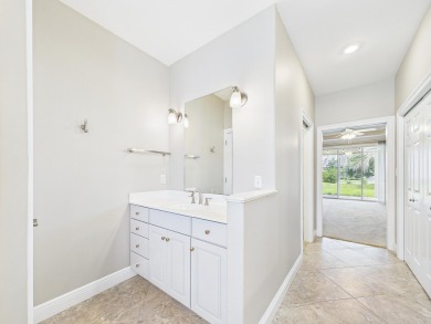 Situated on an oversized lot and a half, this beautifully on Fairway Oaks at Magnolia Golf Course in Florida - for sale on GolfHomes.com, golf home, golf lot