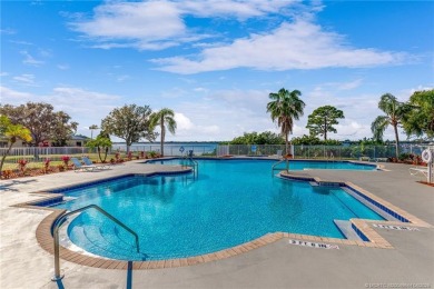 Beautiful 3 bedrooms, 2 bathrooms and an oversized 2 car garage on Santa Lucia River Club in Florida - for sale on GolfHomes.com, golf home, golf lot