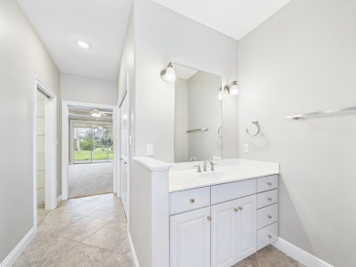 Situated on an oversized lot and a half, this beautifully on Fairway Oaks at Magnolia Golf Course in Florida - for sale on GolfHomes.com, golf home, golf lot
