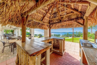 Beautiful 3 bedrooms, 2 bathrooms and an oversized 2 car garage on Santa Lucia River Club in Florida - for sale on GolfHomes.com, golf home, golf lot