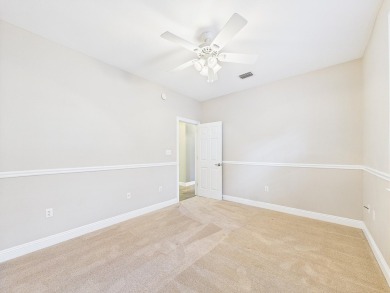 Situated on an oversized lot and a half, this beautifully on Fairway Oaks at Magnolia Golf Course in Florida - for sale on GolfHomes.com, golf home, golf lot