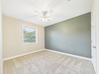 Situated on an oversized lot and a half, this beautifully on Fairway Oaks at Magnolia Golf Course in Florida - for sale on GolfHomes.com, golf home, golf lot