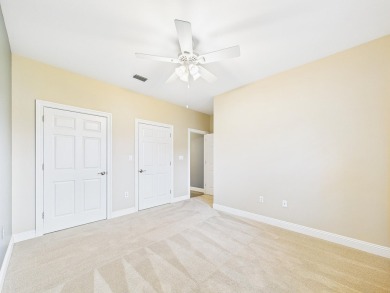 Situated on an oversized lot and a half, this beautifully on Fairway Oaks at Magnolia Golf Course in Florida - for sale on GolfHomes.com, golf home, golf lot
