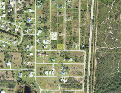 Build your dream home on this third of an acre corner on Live Oak Golf Club and RV Park in Florida - for sale on GolfHomes.com, golf home, golf lot