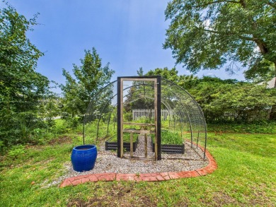 Situated on an oversized lot and a half, this beautifully on Fairway Oaks at Magnolia Golf Course in Florida - for sale on GolfHomes.com, golf home, golf lot