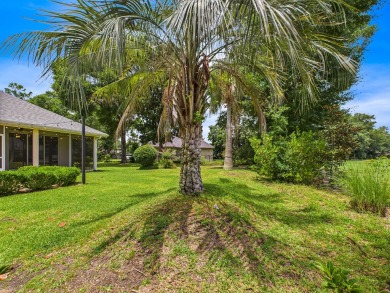 Situated on an oversized lot and a half, this beautifully on Fairway Oaks at Magnolia Golf Course in Florida - for sale on GolfHomes.com, golf home, golf lot