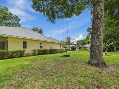 Situated on an oversized lot and a half, this beautifully on Fairway Oaks at Magnolia Golf Course in Florida - for sale on GolfHomes.com, golf home, golf lot