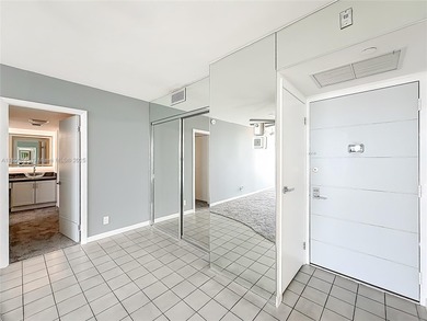 Enjoy unobstructed panoramic views of the Turnberry golf course on Turnberry Isle Resort and Club in Florida - for sale on GolfHomes.com, golf home, golf lot