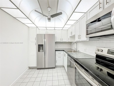 Enjoy unobstructed panoramic views of the Turnberry golf course on Turnberry Isle Resort and Club in Florida - for sale on GolfHomes.com, golf home, golf lot