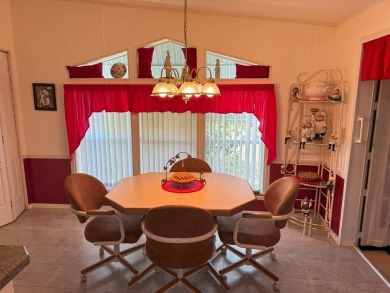 Discover why this highly sought-after two-bedroom, two-bathroom on Four Lakes Golf Club in Florida - for sale on GolfHomes.com, golf home, golf lot