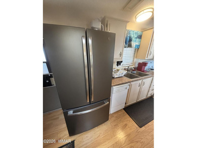 Come see this Beautiful home backing the peaceful Pond and on Juniper Ridge R.V. Golf Resort in Arizona - for sale on GolfHomes.com, golf home, golf lot