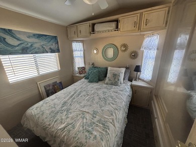 Come see this Beautiful home backing the peaceful Pond and on Juniper Ridge R.V. Golf Resort in Arizona - for sale on GolfHomes.com, golf home, golf lot