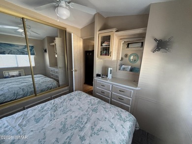 Come see this Beautiful home backing the peaceful Pond and on Juniper Ridge R.V. Golf Resort in Arizona - for sale on GolfHomes.com, golf home, golf lot