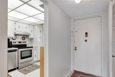 BEAUTIFUL 2/2 CONDO ON DESIRABLE TOP FLOOR WITH GORGEOUS VIEW OF on Inverrary Country Club in Florida - for sale on GolfHomes.com, golf home, golf lot