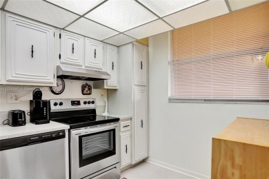 BEAUTIFUL 2/2 CONDO ON DESIRABLE TOP FLOOR WITH GORGEOUS VIEW OF on Inverrary Country Club in Florida - for sale on GolfHomes.com, golf home, golf lot