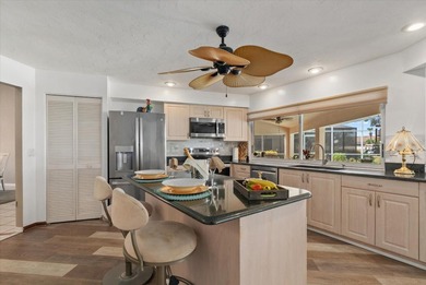 The ultimate Golfer's Sanctuary and Pool Home awaits! Perfectly on Tara Golf and Country Club in Florida - for sale on GolfHomes.com, golf home, golf lot