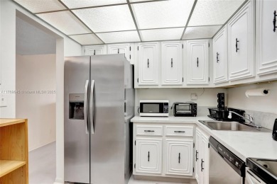 BEAUTIFUL 2/2 CONDO ON DESIRABLE TOP FLOOR WITH GORGEOUS VIEW OF on Inverrary Country Club in Florida - for sale on GolfHomes.com, golf home, golf lot