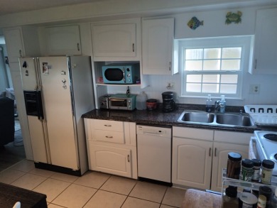 LOCATION, LOCATION! -- Fully Furnished 2/2 in Great Condition -- on Spessard Holland Golf Course in Florida - for sale on GolfHomes.com, golf home, golf lot