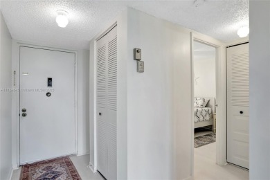 BEAUTIFUL 2/2 CONDO ON DESIRABLE TOP FLOOR WITH GORGEOUS VIEW OF on Inverrary Country Club in Florida - for sale on GolfHomes.com, golf home, golf lot